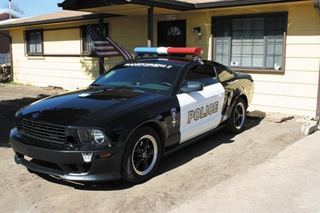 Illustration for article titled Transformers Mustang Cop Car Replica Not Police Approved